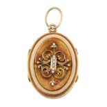 A LATE 19TH CENTURY SEED PEARL LOCKET, the oval locket set to centre with a curled quatrefoil set to