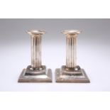 A PAIR OF VICTORIAN SILVER CANDLESTICKS