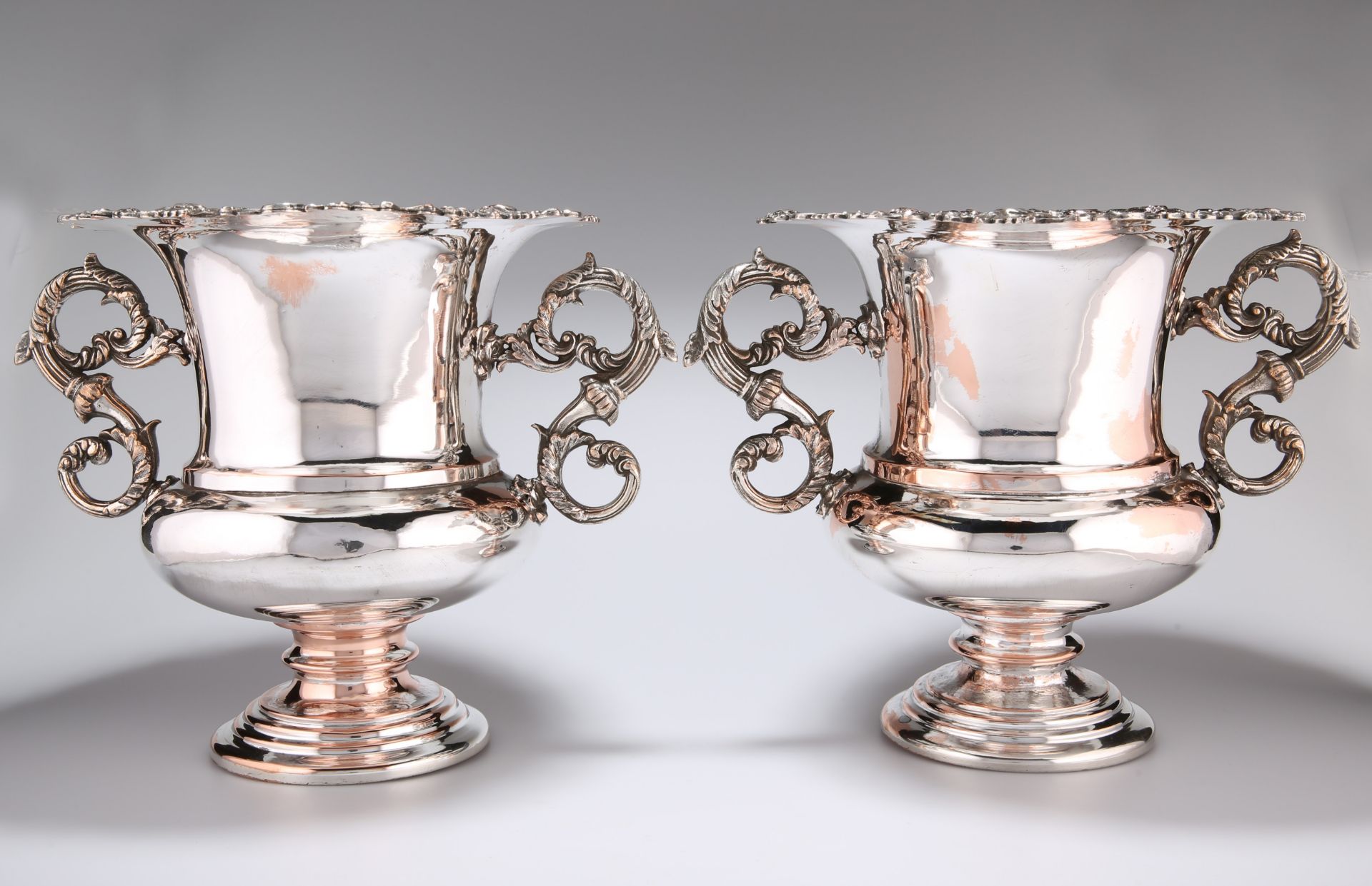 A PAIR OF SILVER-PLATED WINE COOLERS