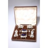 A GEORGE V SILVER SIX-PIECE CRUET SET,