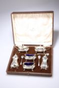 A GEORGE V SILVER SIX-PIECE CRUET SET,