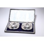 A PAIR OF VICTORIAN SILVER PIERCED DISHES