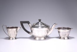 A GEORGE V SILVER THREE-PIECE TEA SERVICE