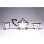 A GEORGE V SILVER THREE-PIECE TEA SERVICE