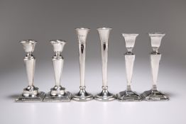 A PAIR OF GEORGE V SILVER CANDLESTICKS