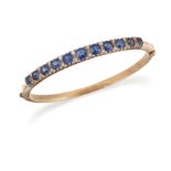 A SAPPHIRE AND DIAMOND BANGLE