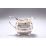 A GEORGE III SILVER CREAM JUG