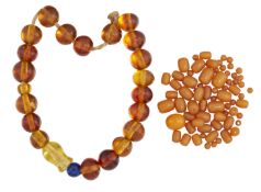 A QUANTITY OF AMBER BEADS AND OTHER SIMILAR