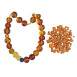 A QUANTITY OF AMBER BEADS AND OTHER SIMILAR