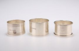 THREE SILVER NAPKIN RINGS