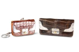 TWO EDWARDIAN SILVER-MOUNTED CROCODILE PURSES