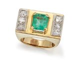 AN EMERALD AND DIAMOND RING