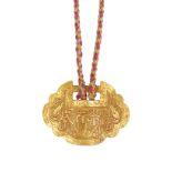 A CHINESE GOLD PENDANT