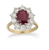 AN 18CT RUBY AND DIAMOND CLUSTER RING