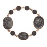 A BRONZE COIN BRACELET