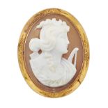 A 9CT SHELL CAMEO BROOCH