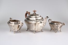 A GEORGE V SILVER THREE-PIECE TEA SERVICE, by John & William F Deakin