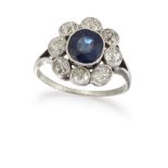 A SAPPHIRE AND DIAMOND CLUSTER RING