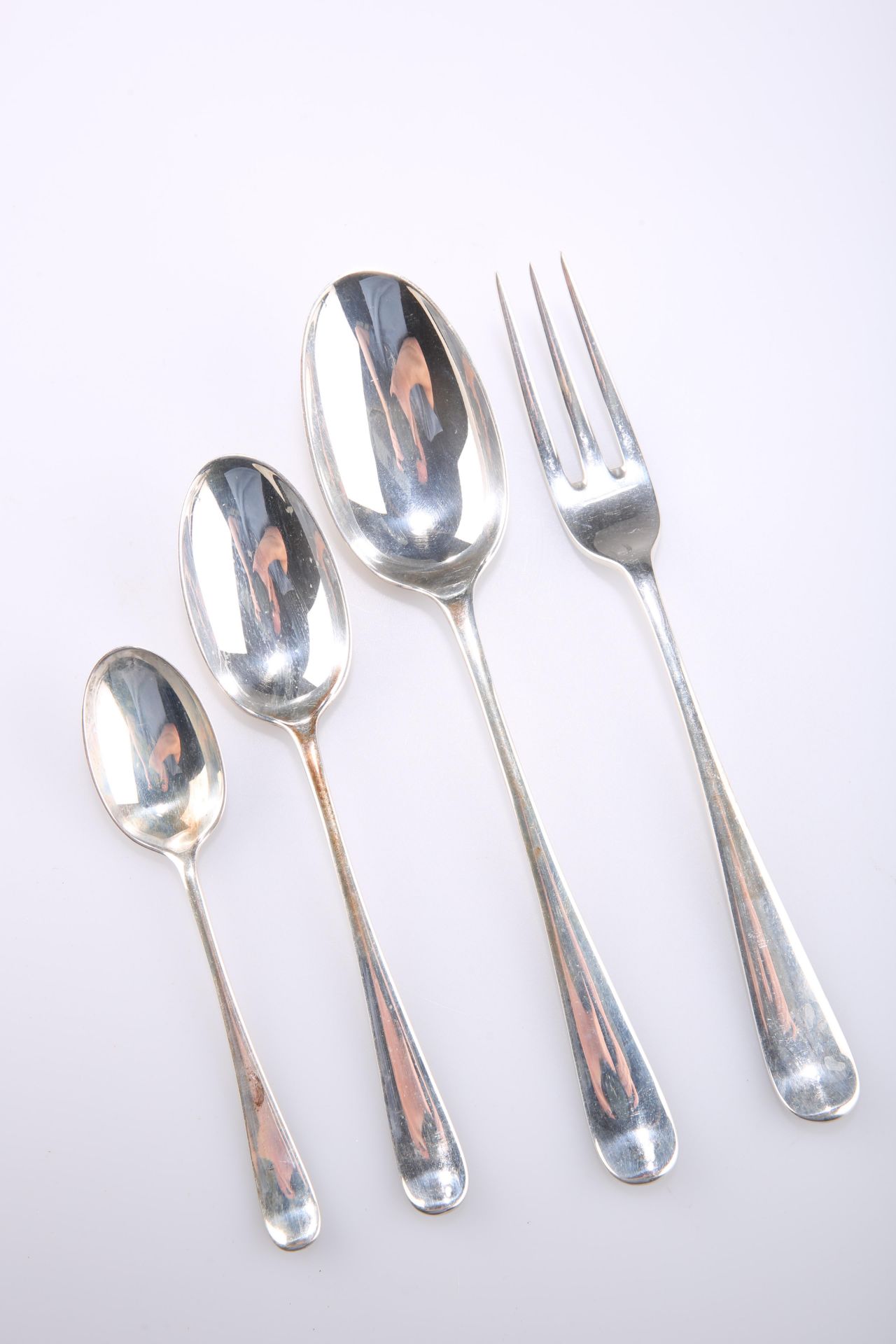 A SILVER TABLE SERVICE OF HANOVERIAN RAT TAIL PATTERN FLATWARE