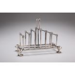 AN AESTHETIC SILVER-PLATED TOAST RACK, IN THE STYLE OF CHRISTOPHER DRESSER