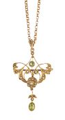 AN EARLY 20TH CENTURY 9CT PERIDOT AND SEED PEARL PENDANT/BROOCH AND CHAIN