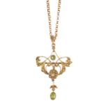 AN EARLY 20TH CENTURY 9CT PERIDOT AND SEED PEARL PENDANT/BROOCH AND CHAIN