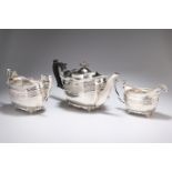 A SILVER THREE-PIECE TEA SERVICE, by Thomas Bradbury & Sons Ltd