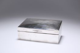 AN EDWARDIAN SILVER CIGARETTE BOX, London 1903, of rectangular form, the hinged lid engraved with