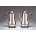 AN ELIZABETH II SILVER COFFEE POT AND HOT WATER POT