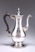 A GEORGE III SILVER COFFEE POT, by Hester Bateman, London 1778, the domed hinged lid with bead