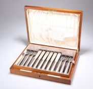 A SET OF TWELVE GEORGE V SILVER FISH KNIVES AND FORKS