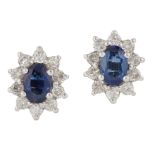 A PAIR OF SAPPHIRE AND DIAMOND CLUSTER EARRINGS