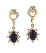 A PAIR OF 9CT SYNTHETIC SAPPHIRE AND DIAMOND EARRINGS, the oval synthetic sapphire earrings claw