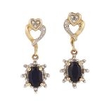 A PAIR OF 9CT SYNTHETIC SAPPHIRE AND DIAMOND EARRINGS, the oval synthetic sapphire earrings claw