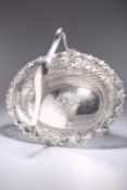 A FINE GEORGE II ROCOCO CAST SILVER SWING-HANDLED CAKE BASKET