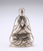 A CHINESE SILVER BUDDHA PEPPER POT