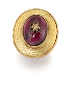 A LATE VICTORIAN GARNET RING, the oval garnet cabochon, approx. 17.6 x 13.1mm, set to centre with