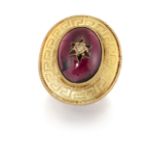 A LATE VICTORIAN GARNET RING, the oval garnet cabochon, approx. 17.6 x 13.1mm, set to centre with