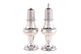 A PAIR OF ELIZABETH II SILVER SALT AND PEPPER CASTERS