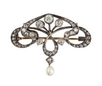 AN EARLY 20TH CENTURY DIAMOND AND PEARL BROOCH