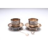 A PAIR OF CHINESE EXPORT SILVER CUPS AND SAUCERS