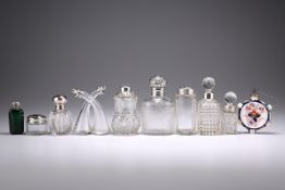 A COLLECTION OF SEVEN VICTORIAN AND LATER SILVER-MOUNTED BOTTLES