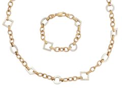 A 9CT YELLOW AND WHITE GOLD FANCY LINK CONVERTIBLE GOLD CHAIN