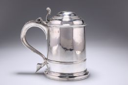 A GEORGE I SILVER LIDDED TANKARD