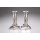 A PAIR OF EDWARDIAN SILVER CANDLESTICKS, IN ADAM STYLE