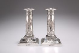 A PAIR OF EDWARDIAN SILVER CANDLESTICKS, IN ADAM STYLE