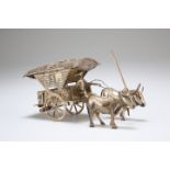 A CONTINENTAL SILVER MODEL OF A CHINESE MAN, OXEN AND CART