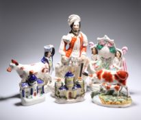 A GROUP OF VICTORIAN STAFFORDSHIRE POTTERY