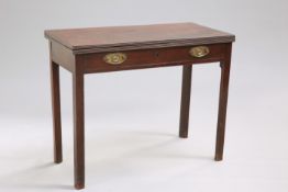 A GEORGE III MAHOGANY FOLDOVER TEA TABLE