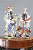 A LARGE PAIR OF CHINESE PORCELAIN FIGURES